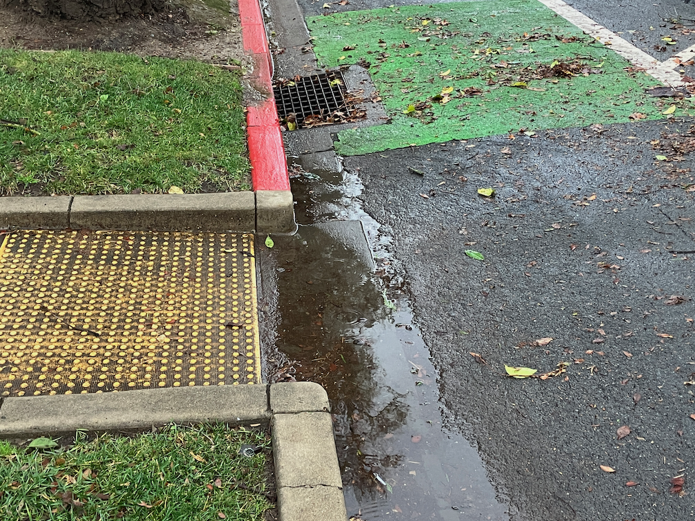 flooded ADA ramp, Q St at 13th St