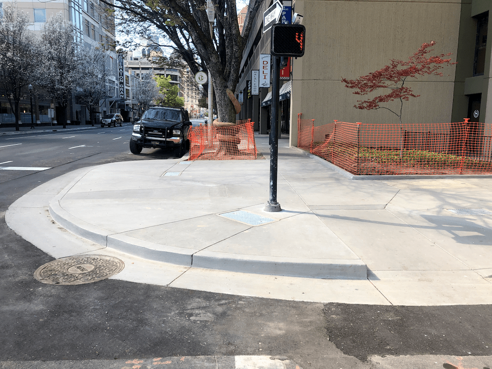 J St & 13th St, northwest corner, true curb extension