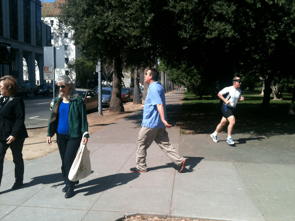 walkers at Capitol Park sidewalk N St & 15th