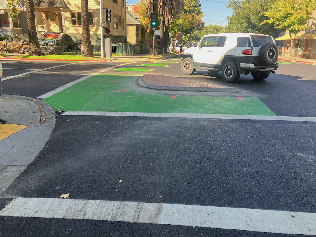 concrete turn wedge island at P St and 21st St