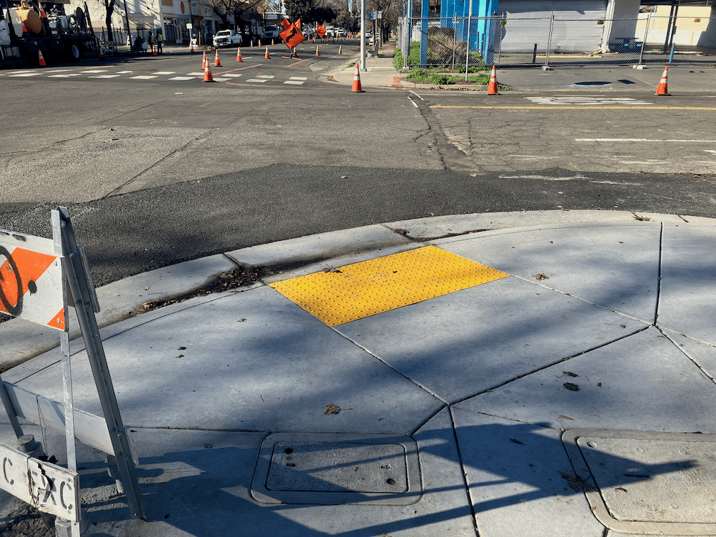 photo of illegal diagonal ramp at Broadway and 18th St
