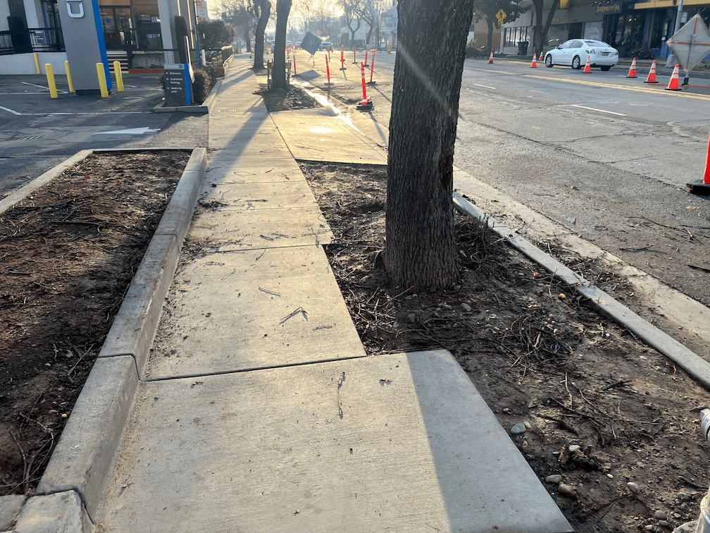 photo of Broadway north side narrow sidewalk between 16th and 17th