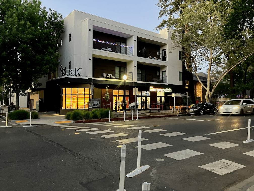 photo of street design and land use that support each other, K St, midtown Sacramento