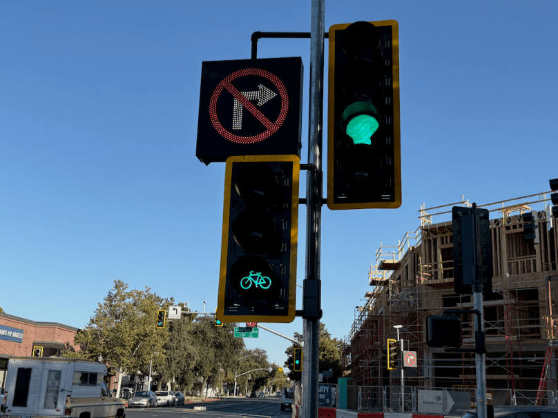 photo of Broadway eastbound at Land Park Dr, signal, bike signal, blank-out no right turn