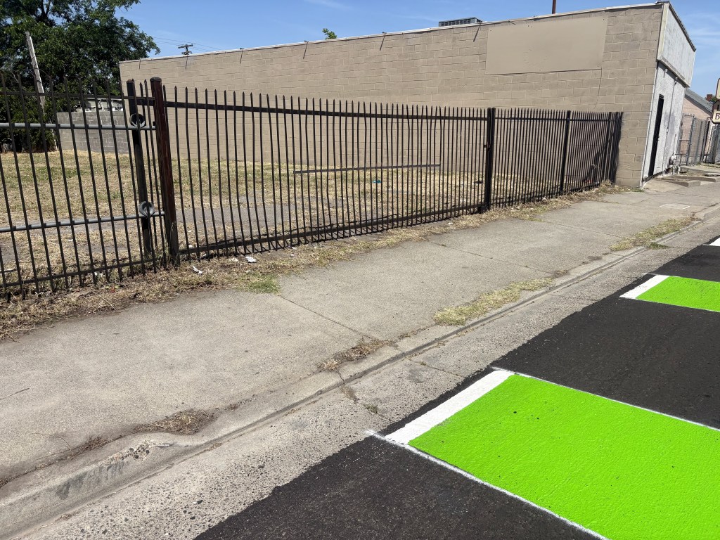 photo of 3617 Marysville Blvd, abandoned driveway with cross-sidewalk slope