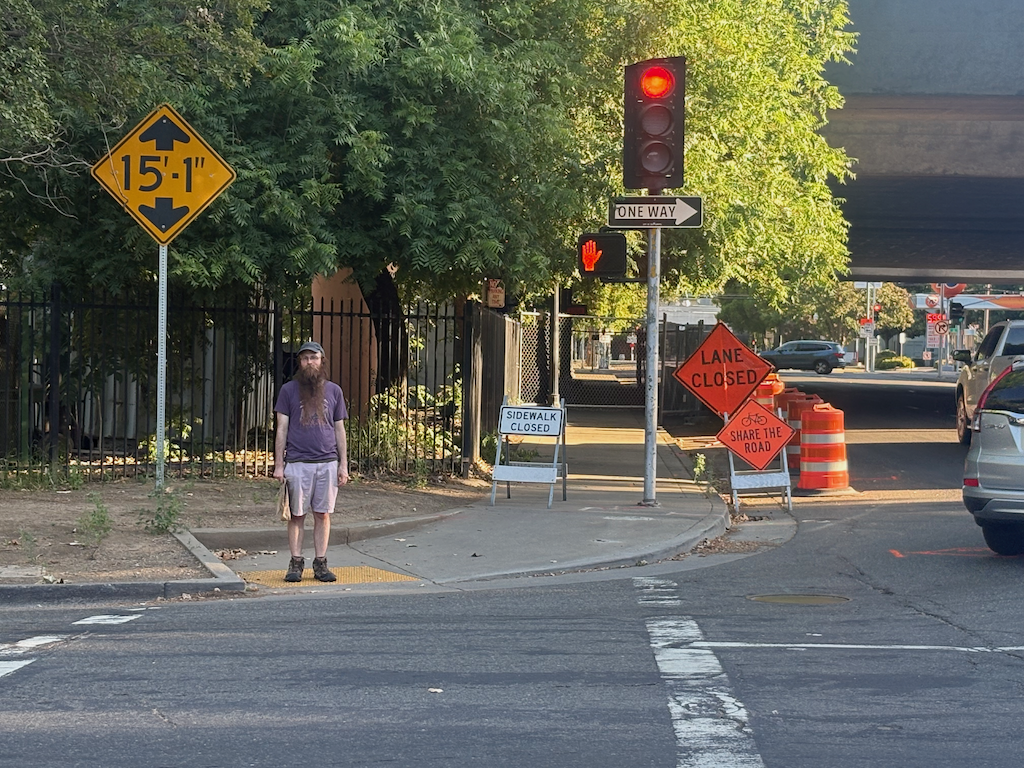 photo of 15th St at W St, pedestrian access blocked