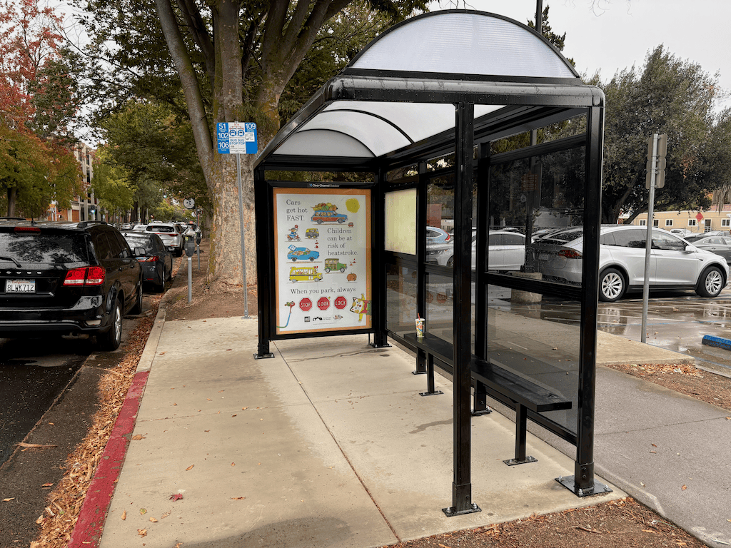 photo of SacRT bus stop, Q St at 7th St, replaced shelter and sign